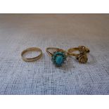 TWO DRESS RINGS AND A WEDDING BAND (3)