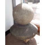 A PAIR OF LIMESTONE PILLAR CAPS, each with 'ball' finials, removed from a 17th/18th century house