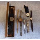 A GENTLEMAN'S RAYMOND WEIL 1970'S BROWN FACED WRISTWATCH in the original fitted case and a