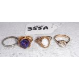 A CAMEO DRESS RING on a 9ct yellow gold shank and three other rings (4)