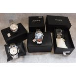 ACCURIST: A COLLECTION OF FOUR GENTLEMAN'S MODERN WRISTWATCHES in original presentation cases