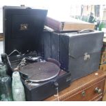 A VINTAGE HMV PICNIC GRAMOPHONE, with 78s including King George V's Speeches from the 1930s