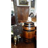 A METAL BOUND OAK BARREL and a pair of carved oak bellows