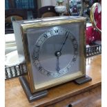 AN ELLIOTT MANTEL TIMEPIECE in wooden and gilt brass case