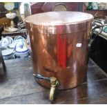 A VICTORIAN COPPER URN with a two handles lid fitted a brass tap, 12" high