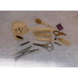 A VICTORIAN BONE NEEDLE CASE and similar items