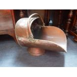 A VICTORIAN BRASS COAL SCUTTLE