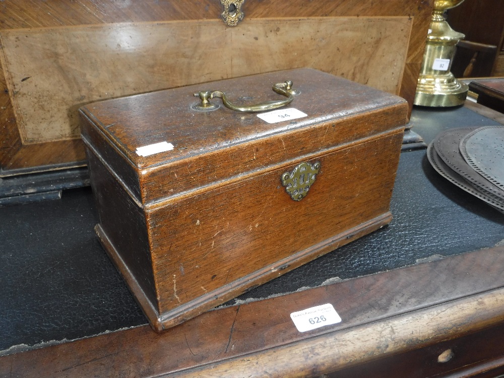 A 19TH CENTURY MAHOGANY BOX with a brass handle, 11" wide