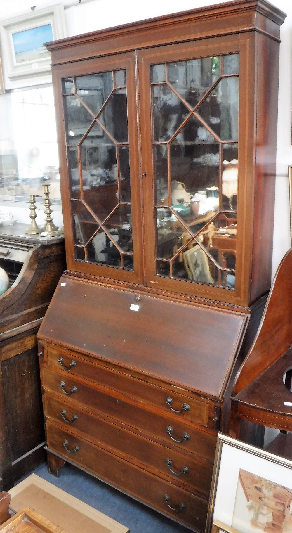 AN EDWARDIAN MAHOGANY BUREAU BOOKCASE, 36" wide