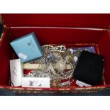 A COLLECTION OF VINTAGE COSTUME JEWELLERY including necklaces, bracelets enclosed in a fabric box