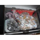 A COLLECTION OF STAMPS, loose and in stock album, postcards, Esso tokens and other items in tin box