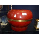 A CHINESE RED LACQUER FOOD CONTAINER, brass bound with cover, 9.5" high