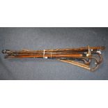 A SILVER MOUNTED WALKING STICK and other similar walking sticks
