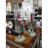 A PAIR OF 19TH CENTURY BRASS CANDLESTICKS with glass shades, 13" high (including shade)