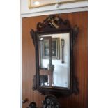 A GEORGE II DESIGN MAHOGANY WALL MIRROR with fretted frame and carved 'Ho Ho bird'