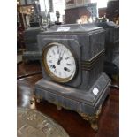 A 19TH CENTURY FRENCH MANTEL CLOCK in a grey marble case, 10" high