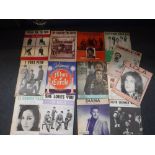 A COLLECTION OF SHEET MUSIC including 'The Beatles, She Loves You' , 'From Me to You', 'I Feel Fine'