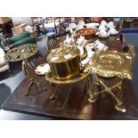 A VICTORIAN BRASS KETTLE and three similar trivets