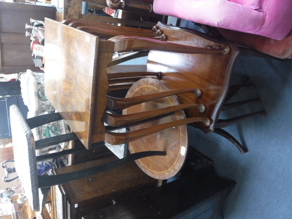 A NEST OF WALNUT TABLES, another similar and two occasional tables