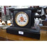 A 19TH CENTURY SLATE-CASED MANTEL CLOCK, 8.5" high