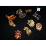 A COLLECTION OF JAPANESE CARVED WOOD NETSUKE including monkeys, rabbit, duck and other animals (9)