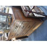 AN EDWARDIAN WALNUT CHEST OF DRAWERS, 100" high x 41"