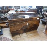 A 19TH CENTURY ROSEWOOD TEA CADDY with fitted interior, 13.5" wide