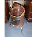 A GEORGE III COPPER PLATE WARMER with a cylindrical semi-covered body, with a brass swing-handle