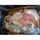 A VICTORIAN PERIOD PORCELAIN HEAD DOLL and other various dolls, some with clothing (one box)