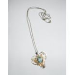 A 14CT YELLOW GOLD PENDANT AND CHAIN, the pendant set with open, aquamarine stone