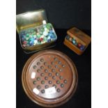 A COLLECTION OF VICTORIAN AND OTHER GLASS MARBLES, a Victorian mahogany Solitaire board and other