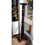 A CARVED AND SPIRAL MAHOGANY 'BEDPOST' TORCHERE, 60" high