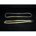 A 9CT YELLOW GOLD ROPE-TWIST DOUBLE ROW NECKLACE (broken) and a yellow metal snake-link necklace (