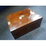 A VICTORIAN ROSEWOOD SEWING BOX with removable tray containing mother-of-pearl spools, silver