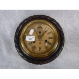 AN EARLY 20TH CENTURY OAK-CASED WALL CLOCK by The Ansonia Clock Co. New York, inscribed 'This