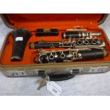 A CONSOLE STEEL EBONISED SELMER CLARINET in original fitted case