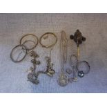 A VICTORIAN WHITE METAL BABY'S RATTLE, a charm bracelet and other silver white metal jewellery