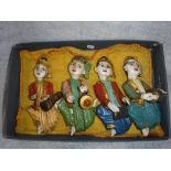 A SET OF FOUR EASTERN CARVED WOOD AND POLYCHROME PAINTED WALL DECORATIONS in the form of band
