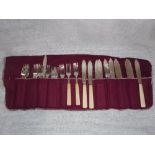A SET OF TWELVE SILVER AND BONE HANDLED FISH KNIVES AND FORKS by Goldsmith's & Silversmith's Co,