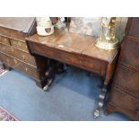 A REGENCY MAHOGANY GAMES TABLE, the top with reversible slide, the interior with leather-lined