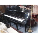 A YAMAHA ELECTRIC BABY GRAND PIANO in a highly polished black case, 59" wide x 34" deep (control