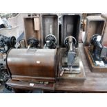 A LATE VICTORIAN 'DAVIS & CO' SEWING MACHINE and three others similar, all with cases (4)