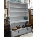 A GREY PAINTED PINE DRESSER, the top with adjustable shelves and three small drawers, the base