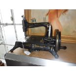 A VICTORIAN CAST-IRON SEWING MACHINE manufactured for John G Murdoch & Co Ltd London & Melbourne,