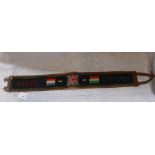 A GREAT WAR LEATHER BELT with a hand sewn panel 'India, 1919' with the flags of France, Great