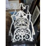 A PAIR OF WHITE PAINTED METAL GARDEN ARMCHAIRS