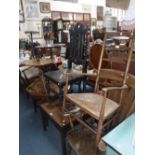 A VICTORIAN OAK HALL CHAIR, three similar chairs and three occasional tables