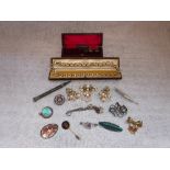 CHRISTIAN DIOR: A VINTAGE PASTE SET BROOCH, a Stirling Silver scroll brooch, a marcasite silver