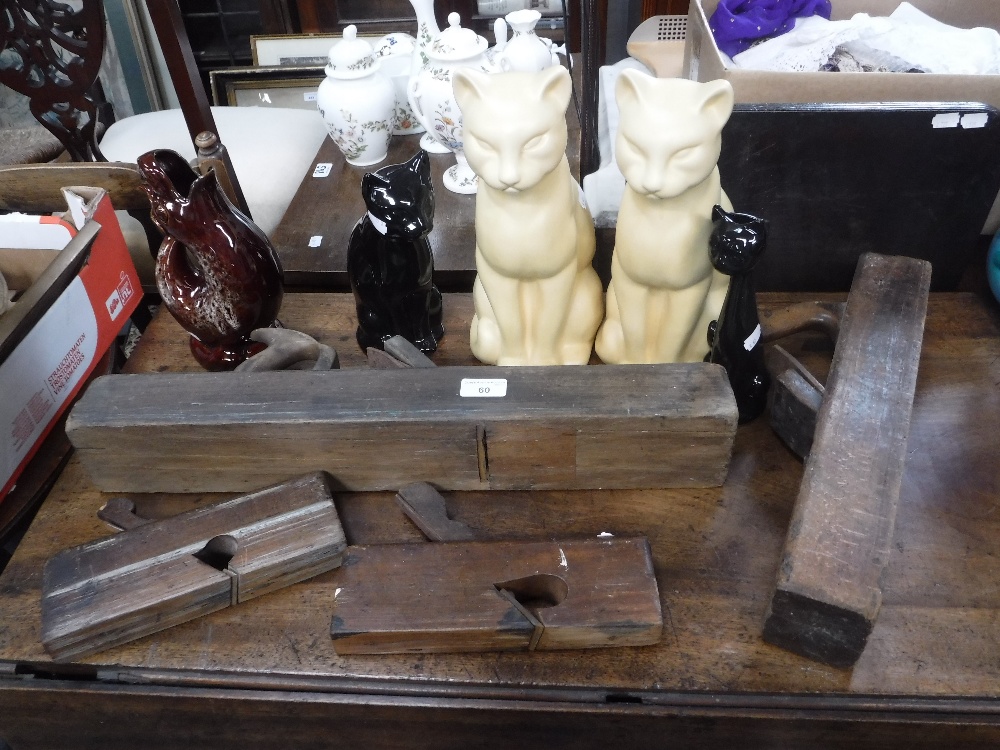 A COLLECTION OF VINTAGE WOODEN PLANES, ceramic cats and a 'gurgle' jug