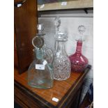 AN 18TH CENTURY CUT-GLASS DECANTER and similar decanters (5)